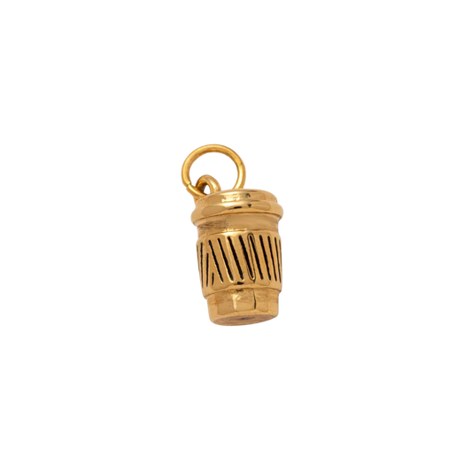 Gold-colored cylindrical pendant on a white background